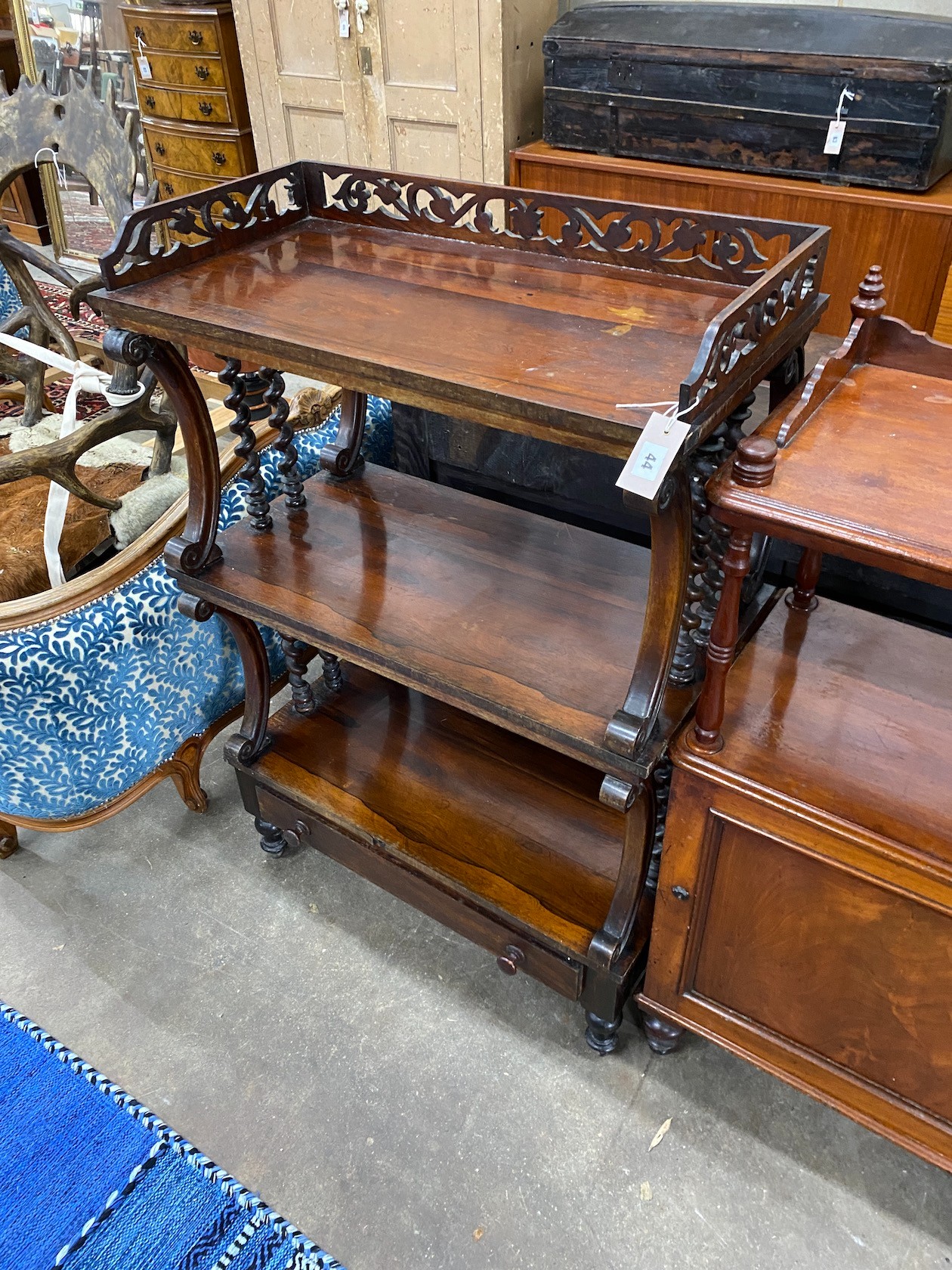 A Victorian rosewood three tier whatnot, width 76cm, depth 40cm, height 114cm